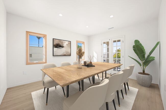 Formal dining room with french doors to private balcony - 862 S Curson Ave