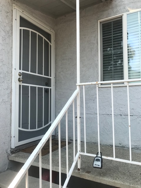 front door, screen has lock - 1406 Cherry Ave