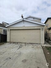 Building Photo - 10739 Mona Blvd