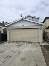 Building Photo - 10739 Mona Blvd