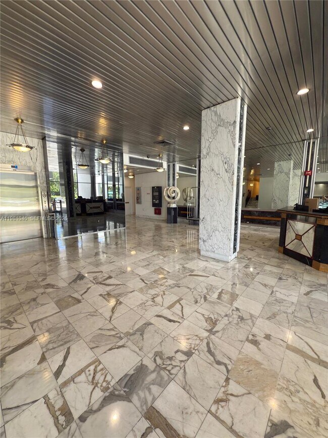 Building Photo - 3675 N Country Club Dr