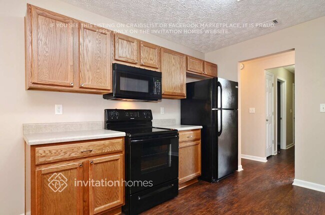 Foto del edificio - 5013 Grist Mill Dr