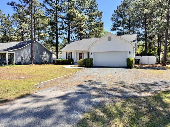 Front with extra side parking - 245 Woodgreen Dr