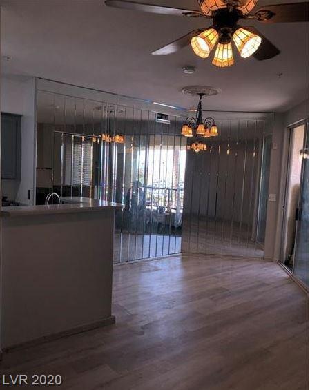 Living area with fireplace - 7151 S Durango Dr