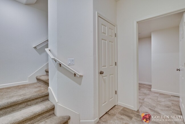 Building Photo - Modern 2-Bed Condo with Tesla Charger & At...