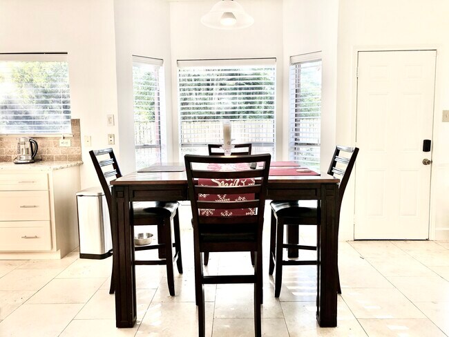 Breakfast room with view of back yard. - 10706 Allens Landing Dr