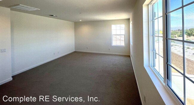 Building Photo - 4 br, 3 bath House - 9630 Honeyberry Ln.
