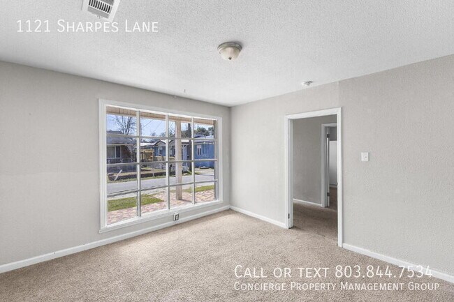 Foto del edificio - 1121 Sharpes Ln