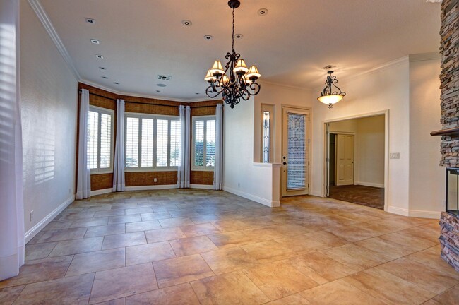 Building Photo - 8973 Rivers Edge - Beautiful Upgraded Coun...