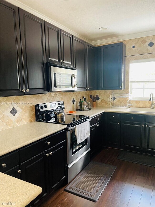 Foto del edificio - 3 br, 2.5 bath House - 648 NW 127th Ave