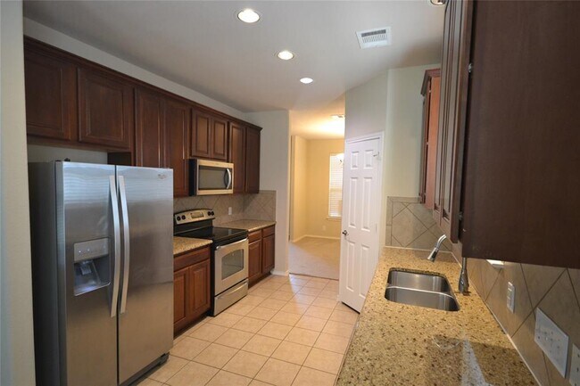 Foto del edificio - 409 Riverine Way