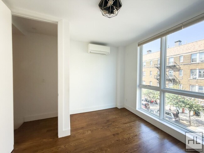 Foto del edificio - Stunning Two-Bedroom Duplex with Soaring 1...
