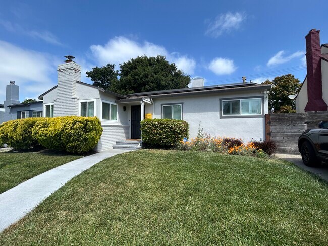 Front of house- manicured lawn and lovely native flowers - 1444 Ohio St