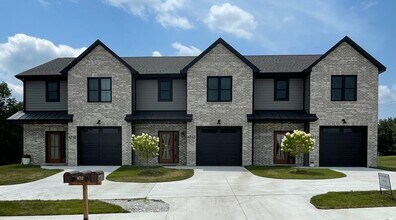 Building Photo - 6711-6715 New Town Ave
