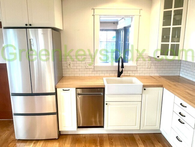 Foto del edificio - Sleek and modern 1-bedroom house in Arbor Lodge with spacious garage or workshop!