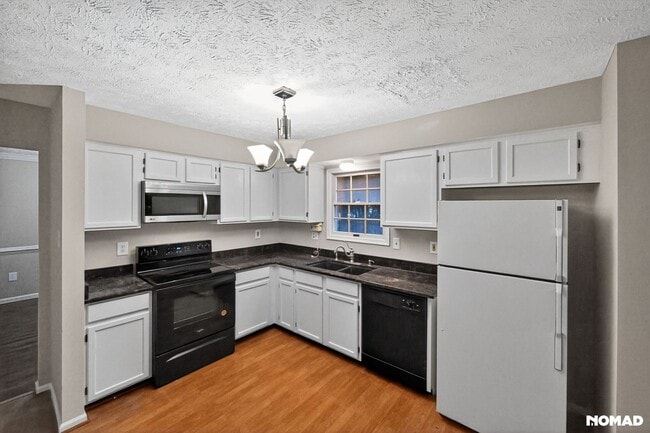 Foto del edificio - 8204 Coneflower Way