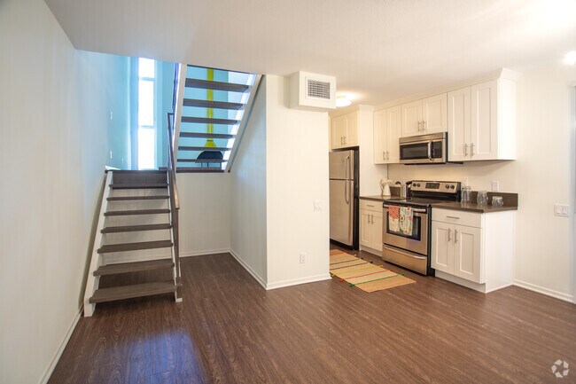 1BR w Loft-700 SF - Village Flats: Mid-Century Design with Modern Convenience