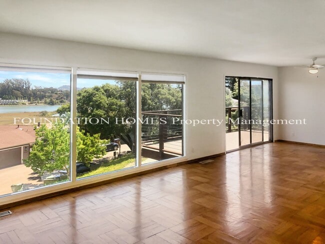 Building Photo - Enjoy sweeping views from top level duplex...
