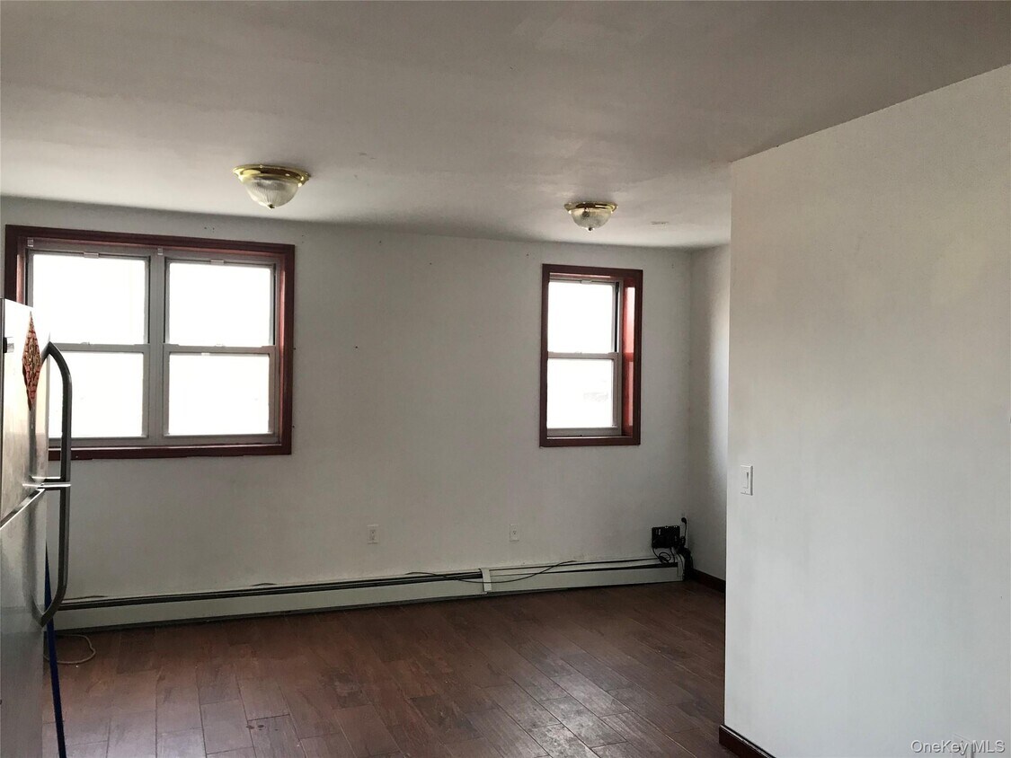 Building Photo - 57-30 Main St