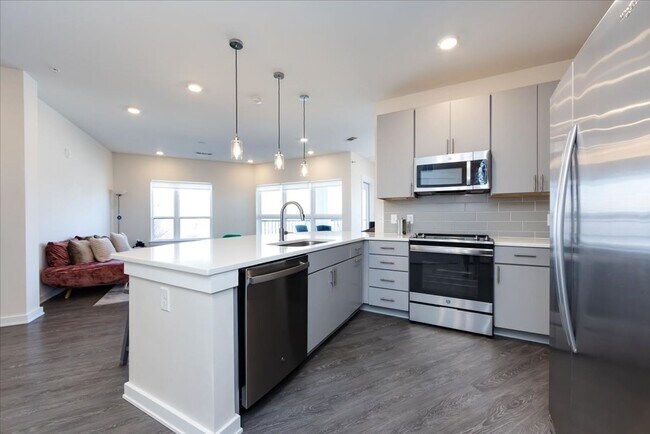 Building Photo - Bright 1BR Corner Condo in NoDa – Walk to Dining, Breweries & Light Rail