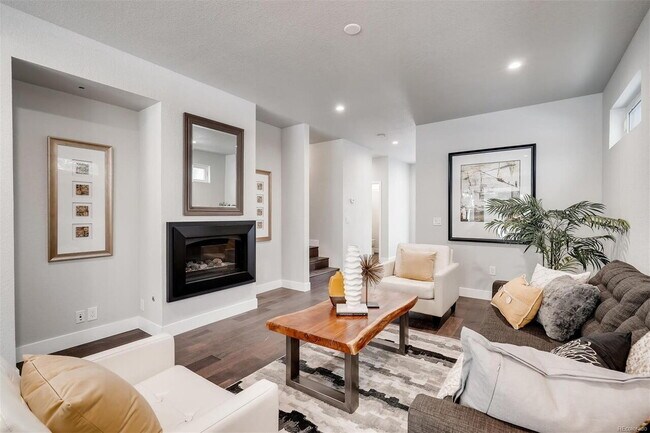 Building Photo - Spacious and Elegant 4-Bedroom Home in the Highlands w/ 3rd Floor Balcony!