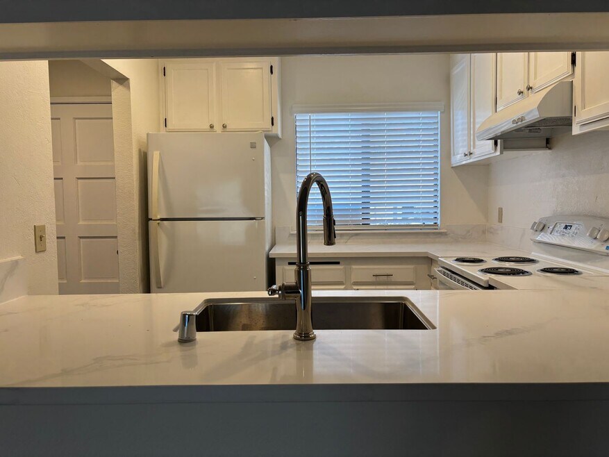 Completely remodeled and updated condo close to Fresno State and shopping. *Ask about the Move-in...