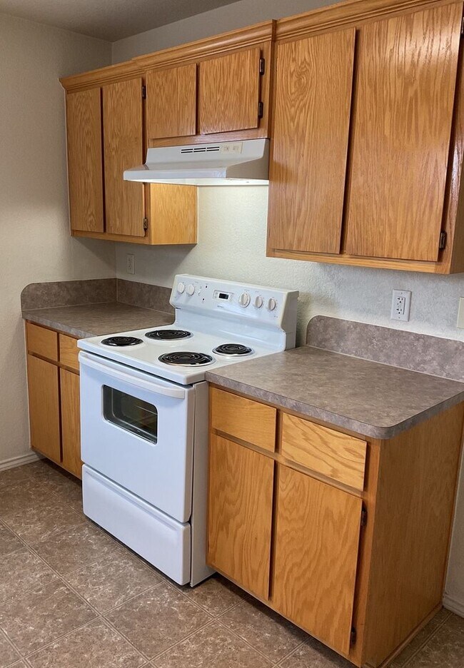 Building Photo - NEW IN MANAGEMENT - AVAILABLE NOW!