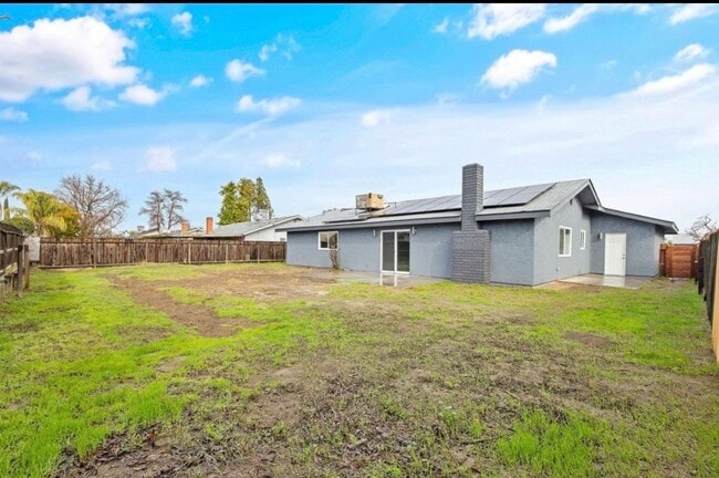 Building Photo - Solar equipped Lemoore home coming soon!