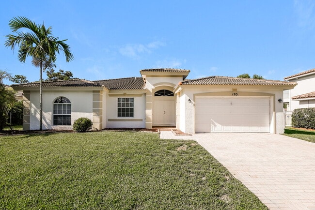 Building Photo - 103 Cocoplum Cir