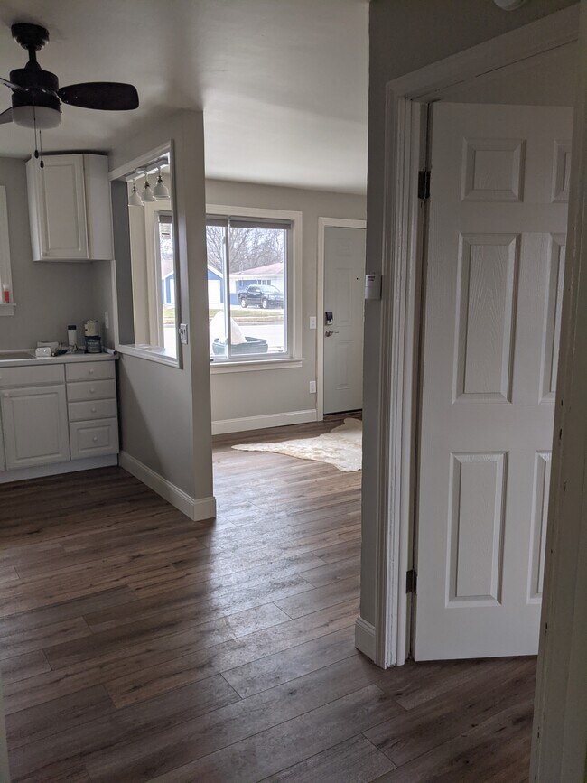 Brand new hardwood floors throughout the unit. As well as brand new front door with keyless entry! - 413 S Hamilton St