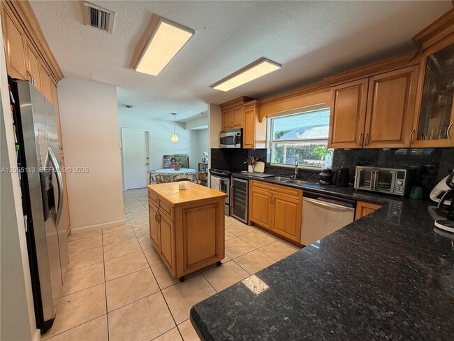 Building Photo - 5721 SW 59th Pl