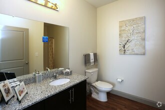 Spacious private primary powder room - Watercourse