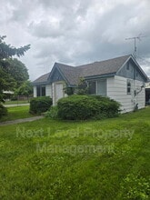 Building Photo - 1003 6th Ave W