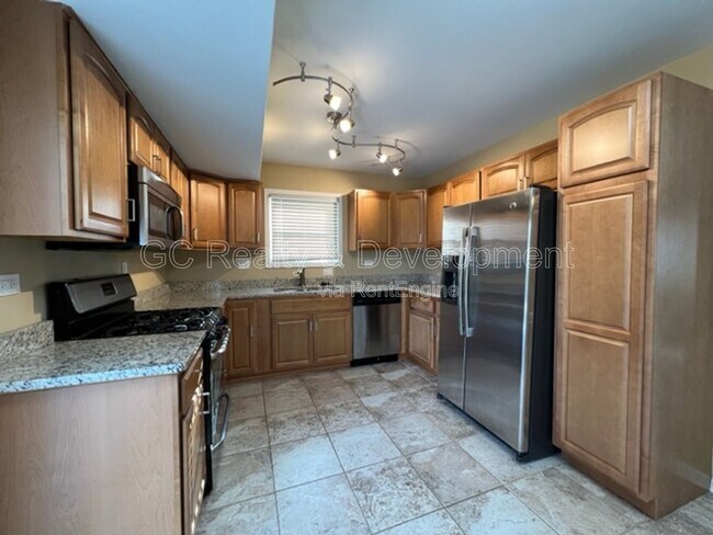 Foto del edificio - 12 Wild Rose Ct