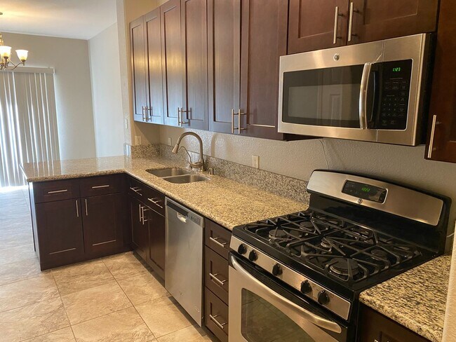 Building Photo - Upgraded townhome in gated Silverado Ranch...