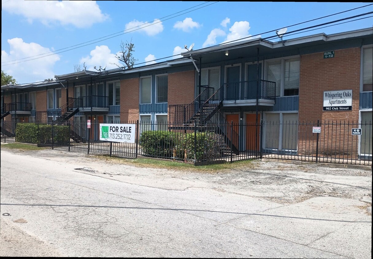 Primary Photo - Whispering Oaks Apartments