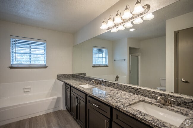 2BR, 2BA - 1,011SF - Primary Bathroom - Timbers Apartment Homes