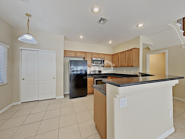 Building Photo - 9996 Aspen Rose St