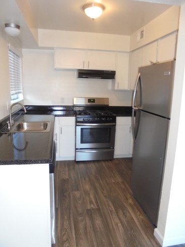 850SQ FT UNIT KITCHEN - Acacia at Carmichael Apartments