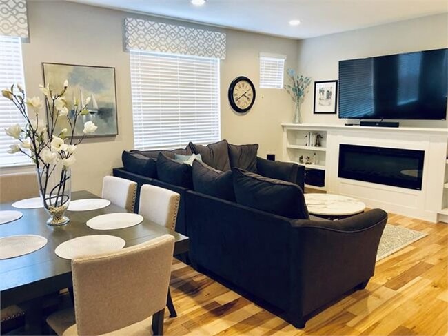 Building Photo - Four Bedroom Townhome with 2-car Garage Av...