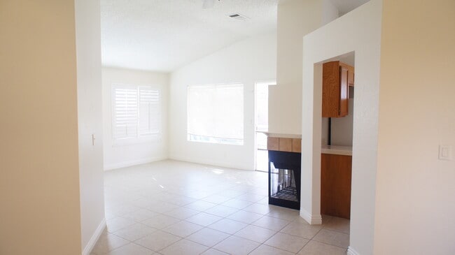 Building Photo - Single-Story Home with Fireplace, Community Pool & Covered Patio