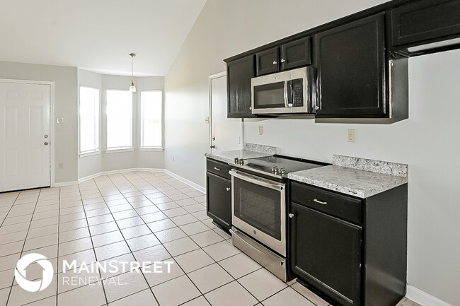 Building Photo - 6464 Elmwood Cove
