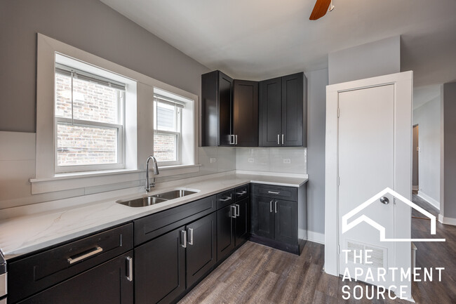 Foto del edificio - 5128 W Henderson St