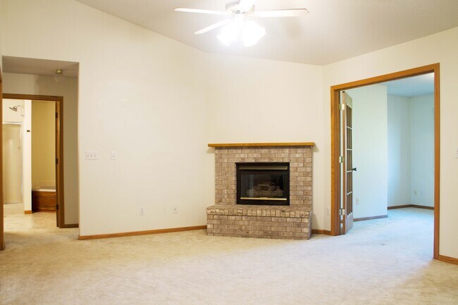 Living room with gas fireplace. - 328 Cayman St