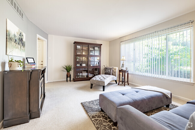 2BD, 1BA - 1,005SF - Living Room - Twin Arbors Apartments