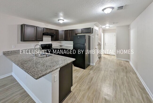 Building Photo - 8500 McGirts Village Ln