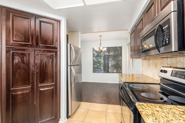 Kitchen w/pantry and dining areas - 4925 E DESERT COVE Ave