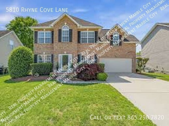 Foto del edificio - 5810 Rhyne Cove Ln