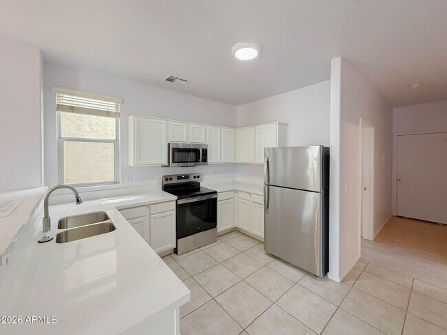 Building Photo - 5216 W Albeniz Pl