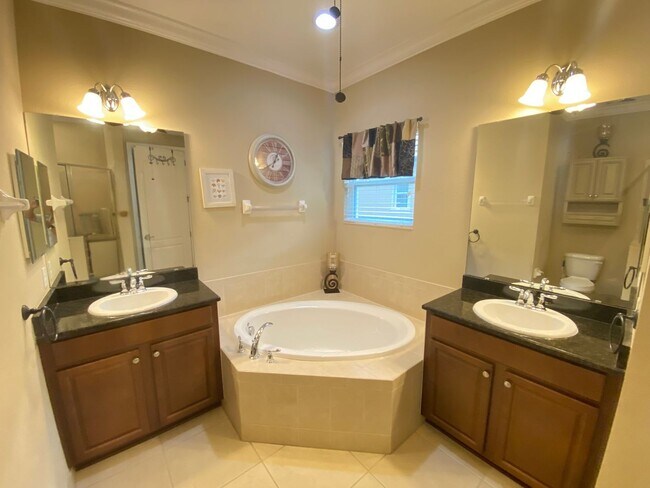 Foto del edificio - EAGLE CREEK (LAKE NONA) - 4BR/3.5BA TWO ST...